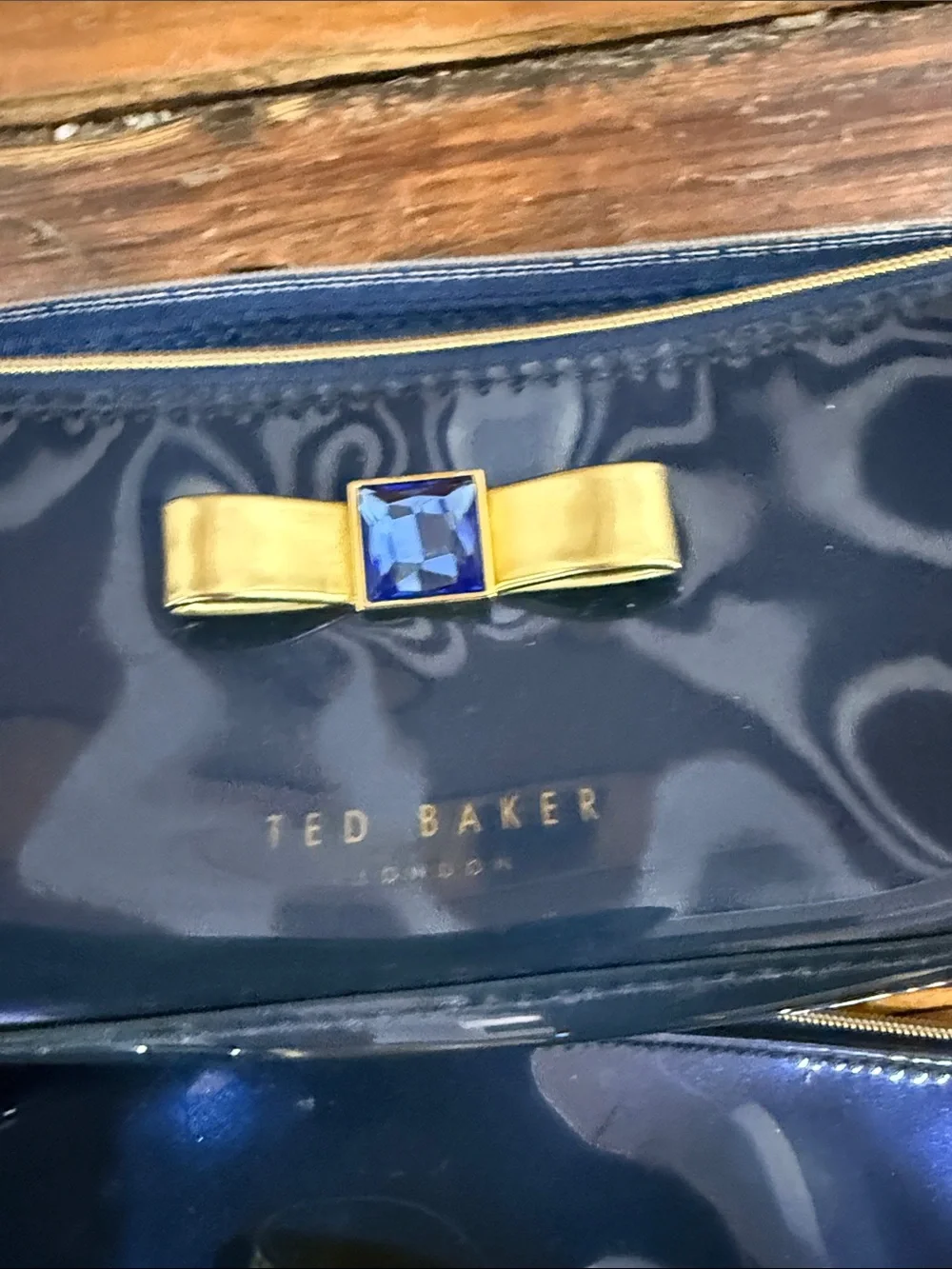 Ted Baker Navy Patent Cosmetic Pouch Set with Gold Bow and Blue Gem
